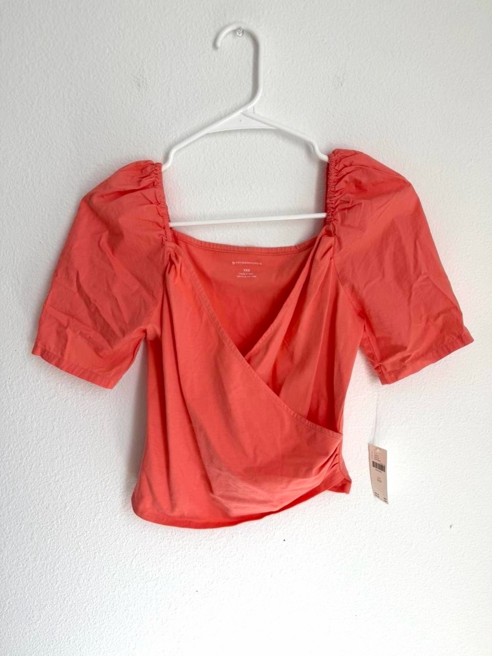 NWT Anthropologie coral pink wrap top with puff sleeves